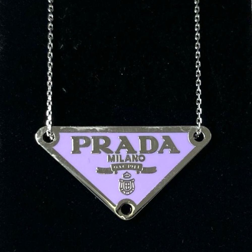 AUTHENTIC Prada charm on sterling silver chain. Purple.